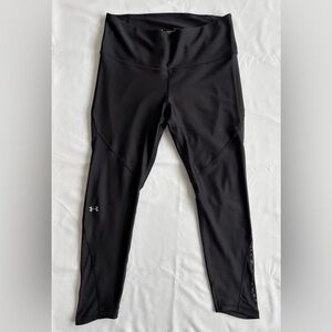 Under Armour HeatGear black leggings with sheer fabric panels (size L)